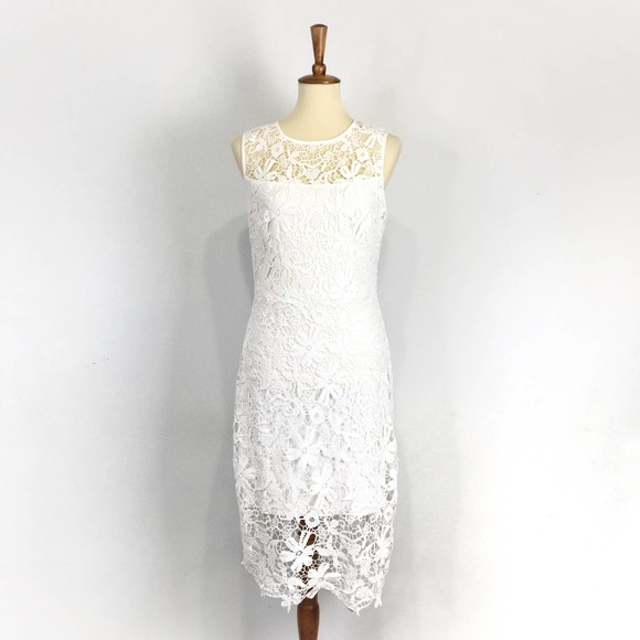 Bisou Bisou Dresses & Skirts - Bison Bisou white lace sleeveless dress by Michelle Bombat Size 10